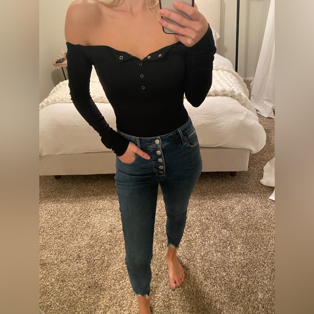 Black long sleeve off the shoulder bodysuit with button detail